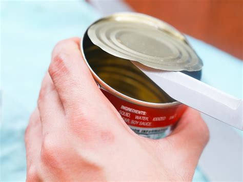 How to open can without can opener - Place the can opener on the top of the tuna can. Insert the blade of the can opener into the lid of the tuna can. Turn the can opener around the circumference of the lid. Continue until the lid is completely cut off. Carefully remove the lid from the tuna can. Beware of sharp edges on both the lid and can itself. 